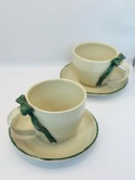 Urocza ceramiczna filiżanka z zielona kokardką ze spodkiem 200 ml.