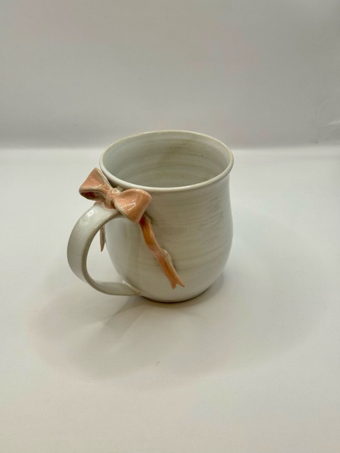 Uroczy kubek ceramiczny z jasnoróżową kokardką ok 250ml